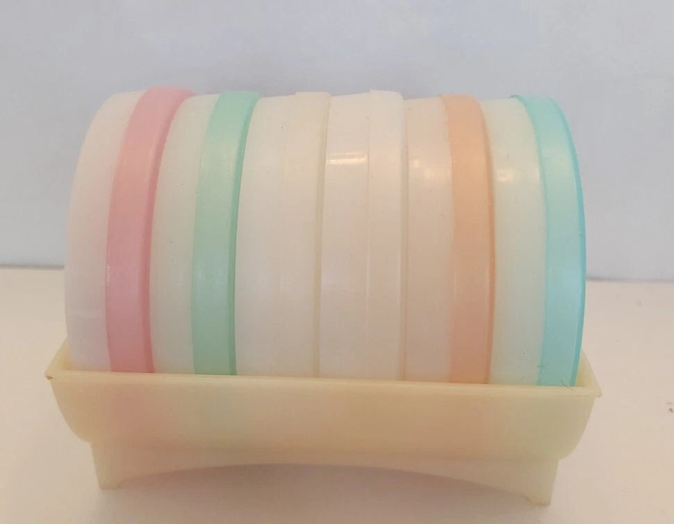 Vtg. 3" Tupperware Pastel Wagon Wheel Coaster Set & Carrier 567 W/ Bon Key Chain | eBay